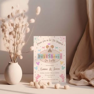 May include: A baby shower invitation with a pastel color scheme and Disney theme. The invitation features the text "Baby Shower On Earth!" and includes the names Sarah & Jason. The invitation is decorated with Mickey Mouse silhouettes and a castle.