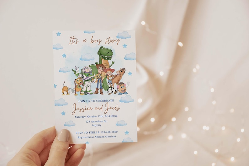 May include: A baby shower invitation card with a watercolor illustration of Toy Story characters, blue clouds, and stars. The text reads "It's a boy story" and invites guests to celebrate Jessica and Jacob.
