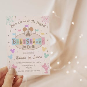 May include: A pastel-colored baby shower invitation with the text "Baby Shower On Earth!" and the names "Sarah & Jason." The invitation features Mickey Mouse silhouettes and castle imagery. The date and time are also included.