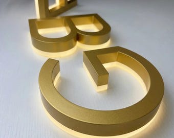Letrero LED personalizado para negocios, letrero con logotipo retroiluminado en acero inoxidable dorado 3D, arte mural iluminado para oficinas.