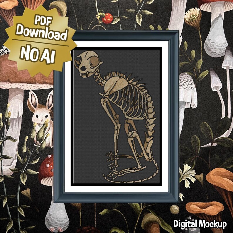 Puede incluir: Un patr&oacute;n de punto de cruz enmarcado que muestra un esqueleto de gato beige sobre un fondo gris oscuro. El marco es azul oscuro con un paspart&uacute; blanco. Una insignia dorada en forma de estrella muestra el texto PDF Download NO AI.