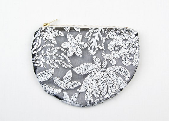 white sequin clutch