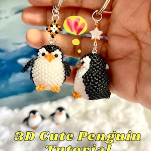 Peut inclure: Deux porte-clés pingouins perlés avec des anneaux argentés. Un pingouin est face à l'avant, l'autre est de profil. Les pingouins sont noirs, blancs et orange. Le texte "3D Cute Penguin Tutorial" est au bas de l'image.