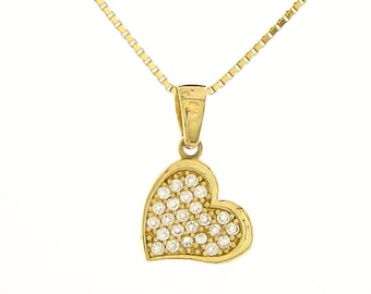 May include: A gold chain necklace with a heart-shaped pendant encrusted with clear cubic zirconia stones.