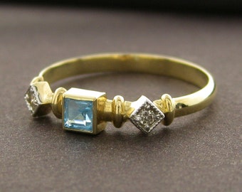 Handmade 14K Gold Ring with Square-Shaped Topaz Symbolizing Strength and Clarity, Accented with Diamonds - Perfect for Special Occasions