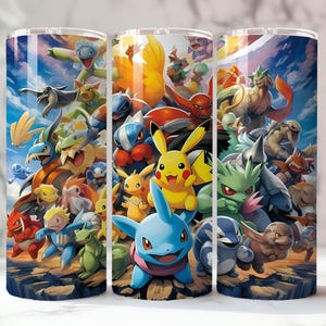 May include: Three stainless steel tumblers feature a vibrant, colorful design of various cartoon characters. The artwork includes a yellow Pikachu, a blue and pink creature, and many other creatures set against a blue sky and rocky terrain.