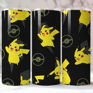 May include: A black tumbler featuring a repeating pattern of yellow Pikachu characters, lightning bolts, and Pok&eacute; Ball designs. The tumbler has a silver lid and is designed for cold beverages.