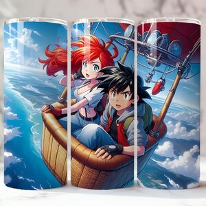 May include: A stainless steel tumbler featuring a vibrant anime-style illustration of two characters in a hot air balloon. The design showcases a blue sky with clouds and ocean, with the characters in the foreground.