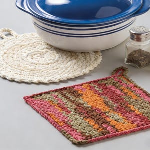 May include: A set of three ceramic mugs with a speckled, matte finish. The mugs are in shades of cream, light gray, and dark gray. Each mug has a simple, minimalist design and a rounded handle.