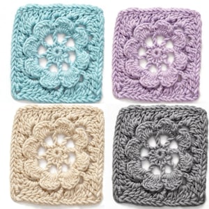 May include: Four crocheted squares in pastel colors: light blue, lavender, beige, and gray. Each square features a central flower design. The squares are handmade and suitable for various craft projects.