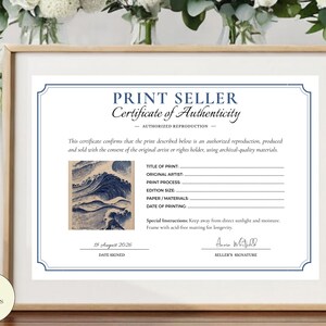 May include: A white certificate of authenticity document in a light wood frame. The text reads PRINT SELLER Certificate of Authenticity, with fields for title, artist, process, edition, paper, and date. It features a blue wave illustration.