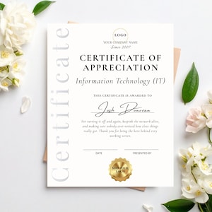 May include: A white certificate of appreciation for Information Technology with black text, a gold logo placeholder, and the name Josh Donovan. The document features the word Certificate vertically in light gray and includes a gold seal at the bottom.