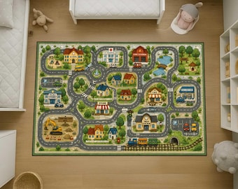 May include: A rectangular area rug featuring a detailed town map illustration with winding grey roads, green trees, and various buildings including a school, hospital, fire station, police station, store, cafe, and train station with a train.