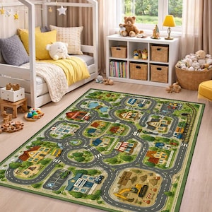 May include: A rectangular area rug featuring a colorful illustrated town map with winding gray roads, green trees, and various buildings including a school, police station, and construction site with a yellow excavator on a green background.