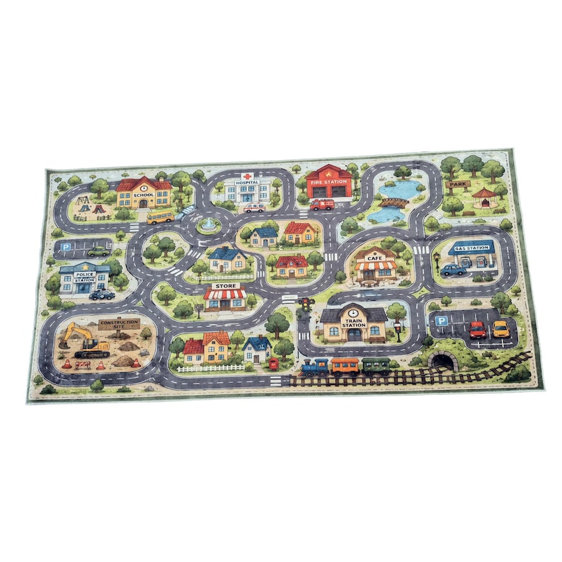 May include: A rectangular play rug featuring a colorful illustrated town map with roads, trees, and buildings labeled as school, hospital, fire station, store, cafe, train station, and gas station. The scene includes a construction site and a train track.
