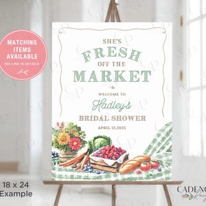 This Fresh Off the Market Bridal Shower Sign is perfect for a farmers market themed celebration. The design features watercolor illustrations of fresh cut flowers, fresh vegetables, mixed berries, crusty bread, and timeless green gingham setting the stage for a charming market style celebration.