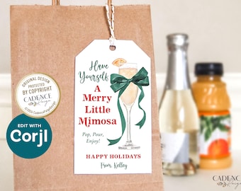 Pode incluir: Etiqueta de presente branca com um laço verde e uma taça de champanhe com uma fatia de laranja. O texto na etiqueta diz "Have Yourself A Merry Little Mimosa. Pop, Pour, Enjoy! Happy Holidays From, Kelley."