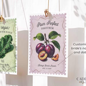 Fresh Off the Market Bridal Shower Banner featuring 18 unique 5x7 hanging signs, each adorned with vibrant fruit and vegetable illustrations and clever love-themed puns. Perfect for adding a fresh, rustic feel to your bridal shower, bachelorette party, or engagement celebration! Hang them all together as a statement piece or scatter them around the venue for a playful touch. Whether displayed indoors or outdoors, this bunting brings a pop of color and a dash of wit to your special day!