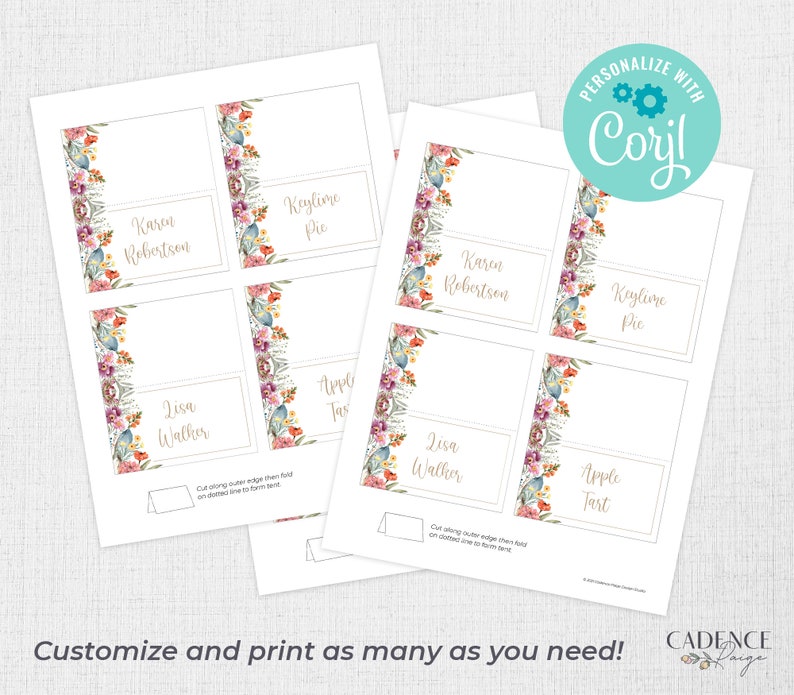 May include: Printable place cards with floral borders. The cards are white with a gold border and feature a watercolor floral design in shades of pink, blue, and green. The text on the cards reads "Karon Robertson", "Keylime Pie", "Lisa Walter", and "Apple Tart".