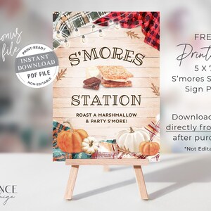 May include: Printable sign for a s'mores station with a rustic autumn theme. The sign features a wooden background with a plaid pattern, pumpkins, and a s'more. The text reads "S'mores Station" and "Roast a marshmallow & party s'more!"