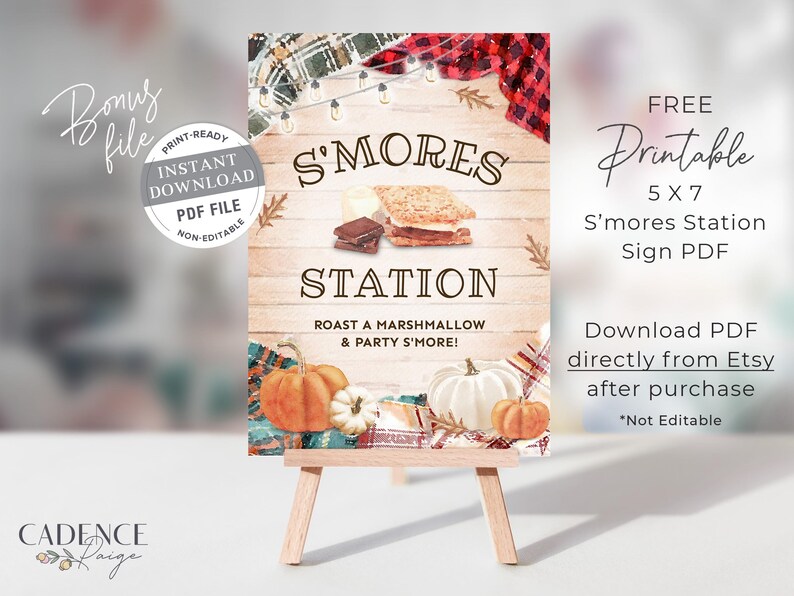 May include: Printable sign for a s'mores station with a rustic autumn theme. The sign features a wooden background with a plaid pattern, pumpkins, and a s'more. The text reads "S'mores Station" and "Roast a marshmallow & party s'more!"