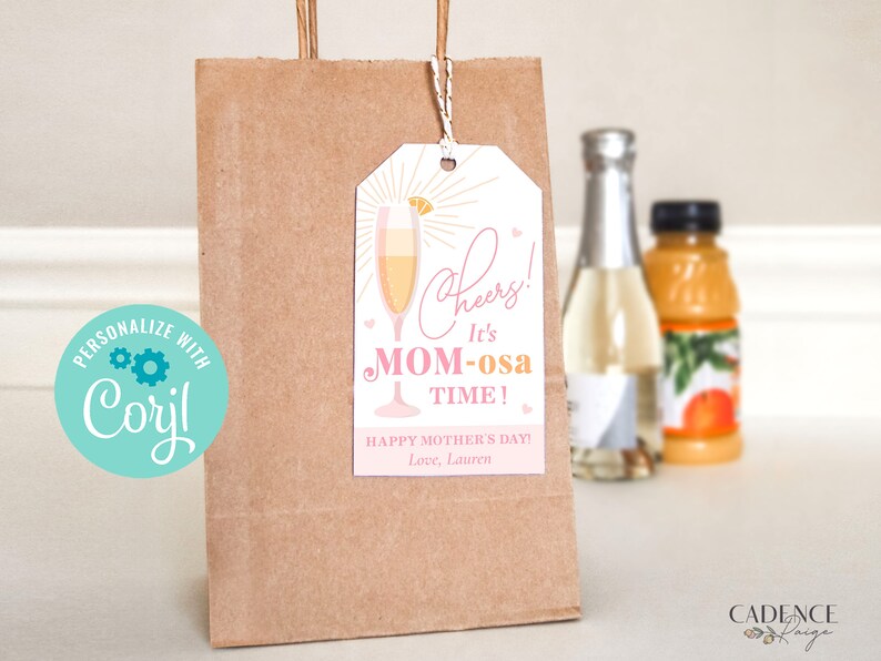 May include: A brown paper gift bag with a pink and gold gift tag that says "Cheers! It's Mom-osa Time! Happy Mother's Day! Love, Lauren".