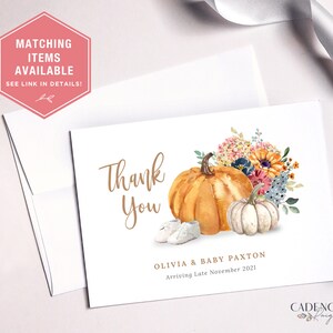 May include: Thank you card featuring a watercolour illustration of pumpkins and flowers. The text reads "Thank You" with the names Olivia & Baby Paxton and the date "Arriving Late November 2021".
