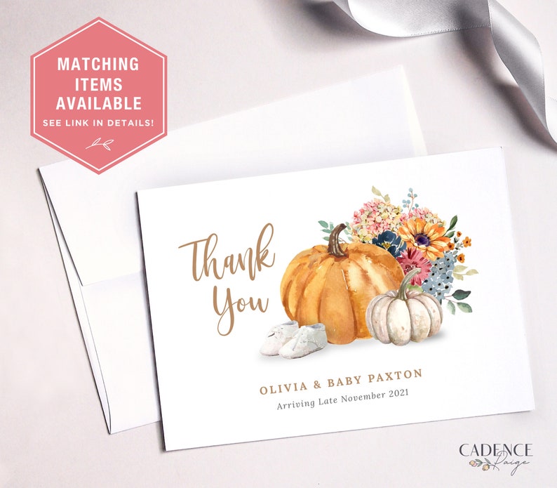 May include: Thank you card featuring a watercolour illustration of pumpkins and flowers. The text reads "Thank You" with the names Olivia & Baby Paxton and the date "Arriving Late November 2021".