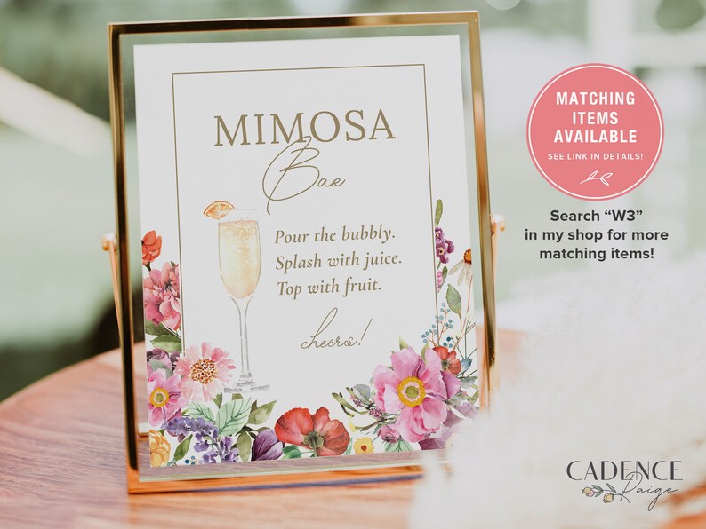 Puede incluir: Un cartel imprimible con un dise&ntilde;o floral y el texto "MIMOSA Bae" en escritura dorada. El cartel tambi&eacute;n incluye instrucciones para hacer mimosas: "Vierte el espumoso. Salpica con jugo. C&uacute;brelo con fruta. &iexcl;Salud!"
