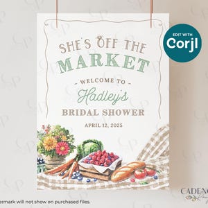 May include: A printable bridal shower sign with a watercolor illustration of a picnic basket filled with fruit, vegetables, and bread. The sign reads "She's Off The Market - Welcome to Hadley's Bridal Shower - April 12, 2025".