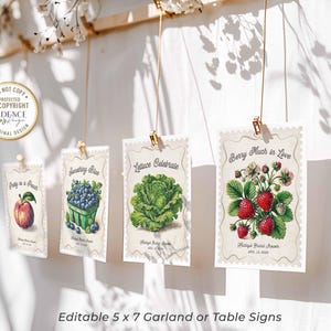 Fresh Off the Market Bridal Shower Banner featuring 18 unique 5x7 hanging signs, each adorned with vibrant fruit and vegetable illustrations and clever love-themed puns. Perfect for adding a fresh, rustic feel to your bridal shower, bachelorette party, or engagement celebration! Hang them all together as a statement piece or scatter them around the venue for a playful touch. Whether displayed indoors or outdoors, this bunting brings a pop of color and a dash of wit to your special day!