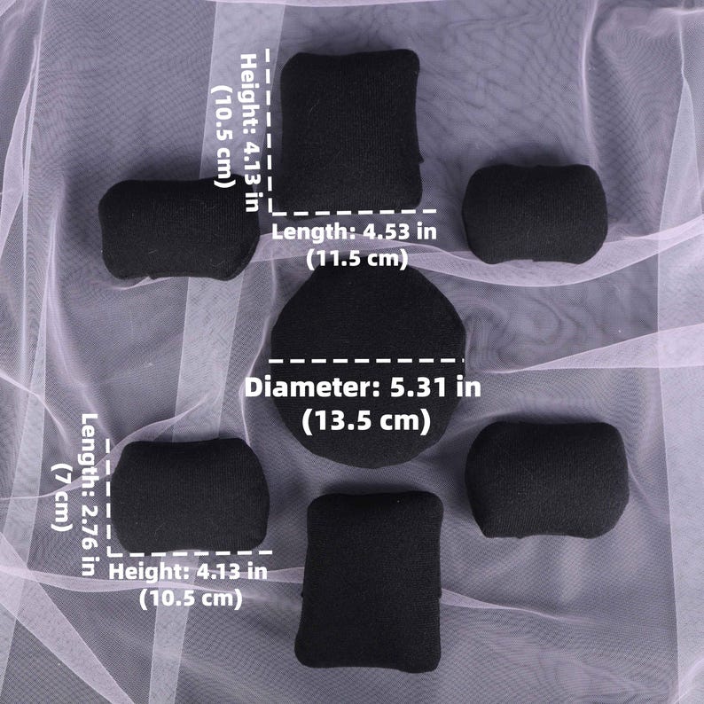 May include: A collection of black fabric items, including rectangular and oval shapes, are arranged on a light background. The dimensions are labeled: height 4.13 in (10.5 cm), length 4.53 in (11.5 cm), diameter 5.31 in (13.5 cm), and length 2.76 in (7 cm).