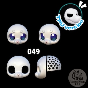 May include: White 3D-printed seal head with large blue eyes and a pink nose. The image shows multiple views of the head, including a split view revealing the interior structure. Text includes "049" and "TPU version."