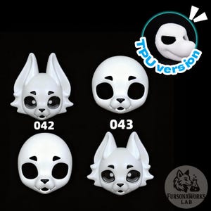 Op de afbeelding: Vier witte dierenmaskers met zwarte oog- en neusdetails. Twee maskers hebben grote oren en twee zijn rond. De maskers zijn gelabeld met "042" en "043". Een cirkelvormige afbeelding toont een wit masker met de tekst "TPU version". Het FursonaWorks Lab-logo staat rechtsonder.