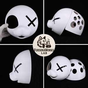 May include: White, round mask with black 'X' eye markings and a small nose. The mask is shown in multiple views, including a split version with circular cutouts on the back. The logo 'FursonaWorks Lab' is also visible.