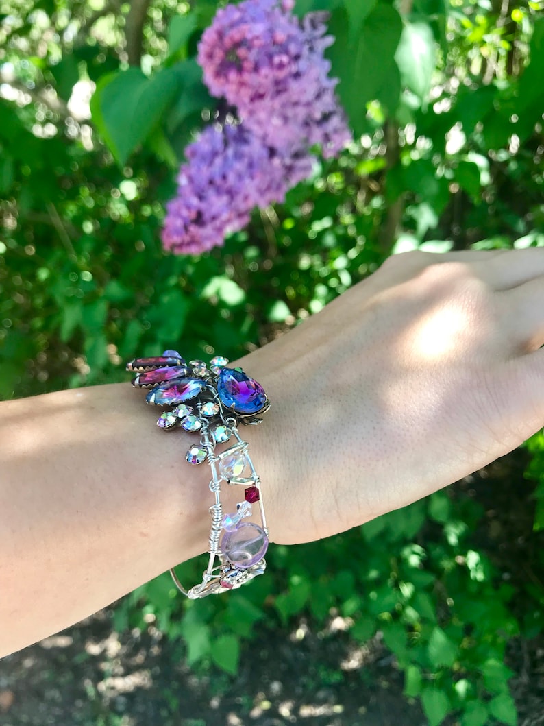 crystal and gem stones. Purple wire wrapped sterling silver bracelet from vintage earrings