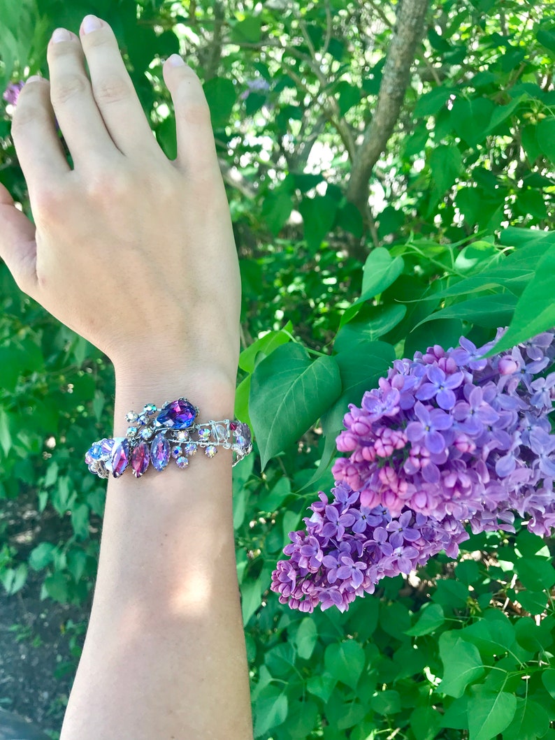 crystal and gem stones. Purple wire wrapped sterling silver bracelet from vintage earrings