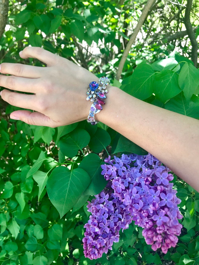 crystal and gem stones. Purple wire wrapped sterling silver bracelet from vintage earrings