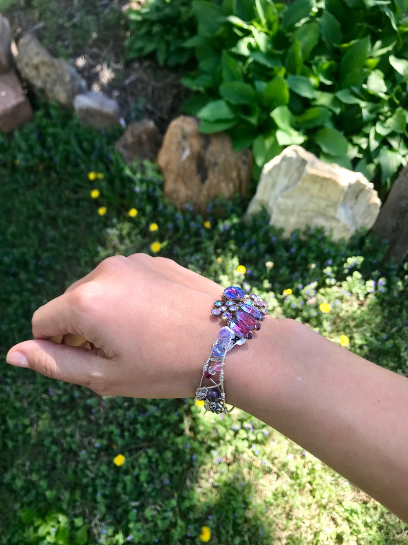 crystal and gem stones. Purple wire wrapped sterling silver bracelet from vintage earrings