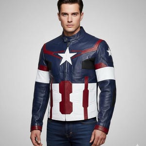 May include: A navy blue leather jacket with white and red accents, featuring a large white star on the chest and a smaller star on the shoulder. The jacket has a stand-up collar and a zipper closure. The jacket's design is inspired by a superhero.