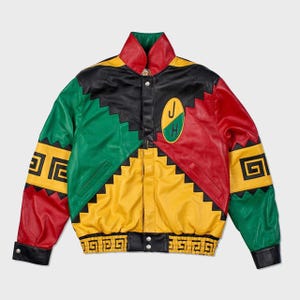 May include: A vibrant leather jacket in a patchwork design, featuring red, yellow, green, and black panels. It has geometric patterns and an embroidered patch with the letters "J" and "H".