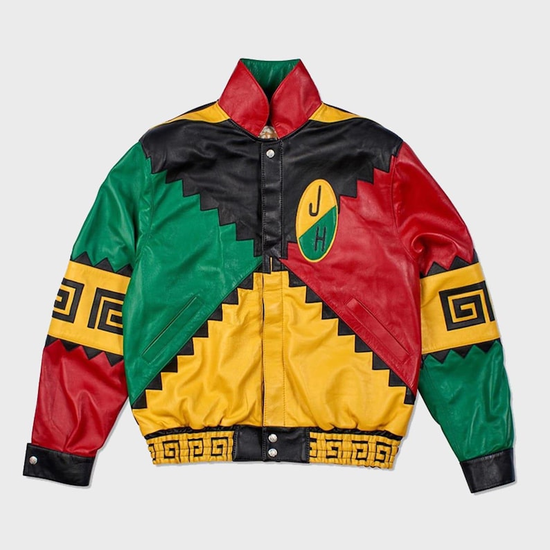 May include: A vibrant leather jacket in a patchwork design, featuring red, yellow, green, and black panels. It has geometric patterns and an embroidered patch with the letters "J" and "H".