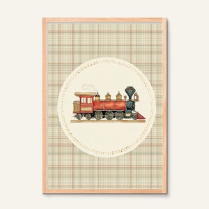 May include: Framed artwork featuring a watercolor illustration of a vintage red and gold steam train. The train is centered on a cream-colored circle with a dotted border, set against a plaid background. The text "BUDS & BLOOMS Art that feels like home" is at the bottom.