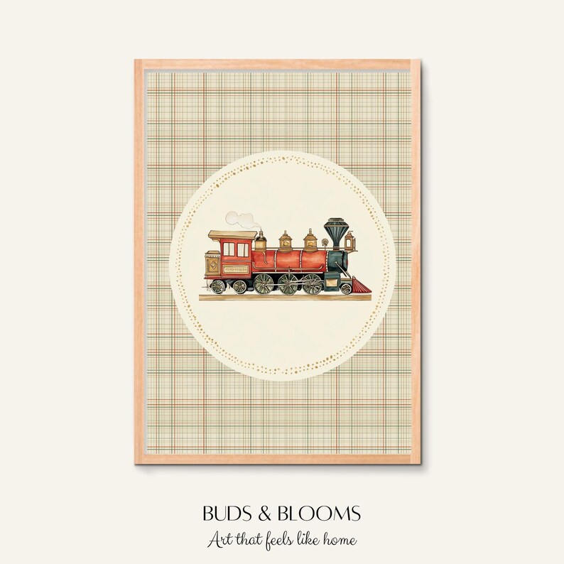 May include: Framed artwork featuring a watercolor illustration of a vintage red and gold steam train. The train is centered on a cream-colored circle with a dotted border, set against a plaid background. The text "BUDS & BLOOMS Art that feels like home" is at the bottom.