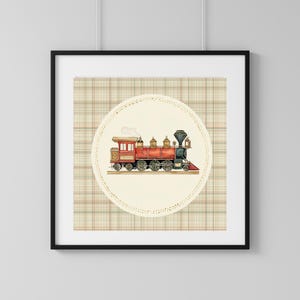 May include: A framed print featuring a vintage train illustration. The train is primarily red with black and gold accents, set against a cream-colored circle with a dotted border. The background is a plaid pattern in beige, red, and green.