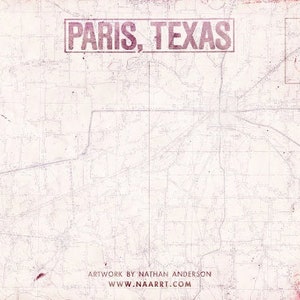 May include: A vintage-style map of Paris, Texas, with a faded, distressed look. The map is printed on a white background with light pink lines and text. The text "PARIS, TEXAS" is printed in a bold, red font at the top of the map. The text "ARTWORK BY NATHAN ANDERSON" and "WWW.NAARRT.COM" is printed at the bottom of the map.