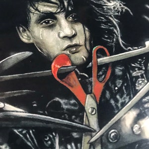 May include: A black and white illustration of a man with long black hair, wearing a black leather jacket. He is holding a pair of red scissors to his mouth. The scissors are partially obscured by his hair.