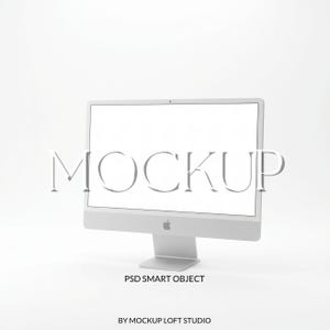 May include: A silver desktop computer with a blank white screen. The word "MOCKUP" is displayed in a light gray font across the screen. Below the screen, the text "PSD SMART OBJECT" is visible. The words "BY MOCKUP LOFT STUDIO" are at the bottom.