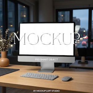 May include: A silver iMac computer with a white screen, keyboard, and mouse on a wooden desk. The screen displays the word "MOCKUP". The text "PSD SMART OBJECT" is below the screen. The background shows a window with a city view.
