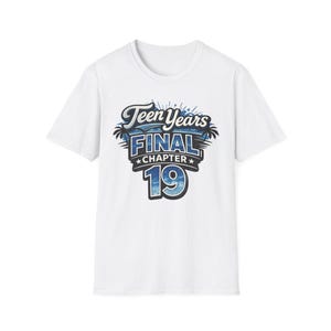 May include: White t-shirt with a blue and white graphic that reads "Teen Years Final Chapter 19". The design includes palm trees and stars, creating a celebratory theme. The shirt is a classic crew neck style.